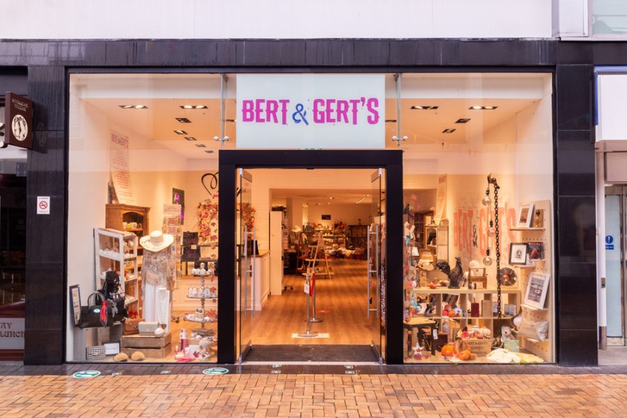 The entrance to an office with a sign that says bet & ger's, showcasing office branding.