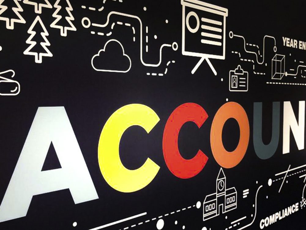 A blackboard displaying the office branding for accounting.