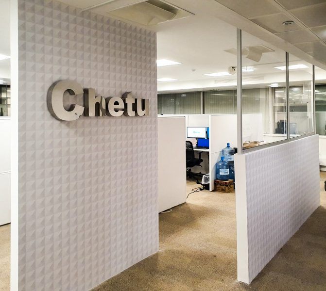 An office with the word chetu on the wall.